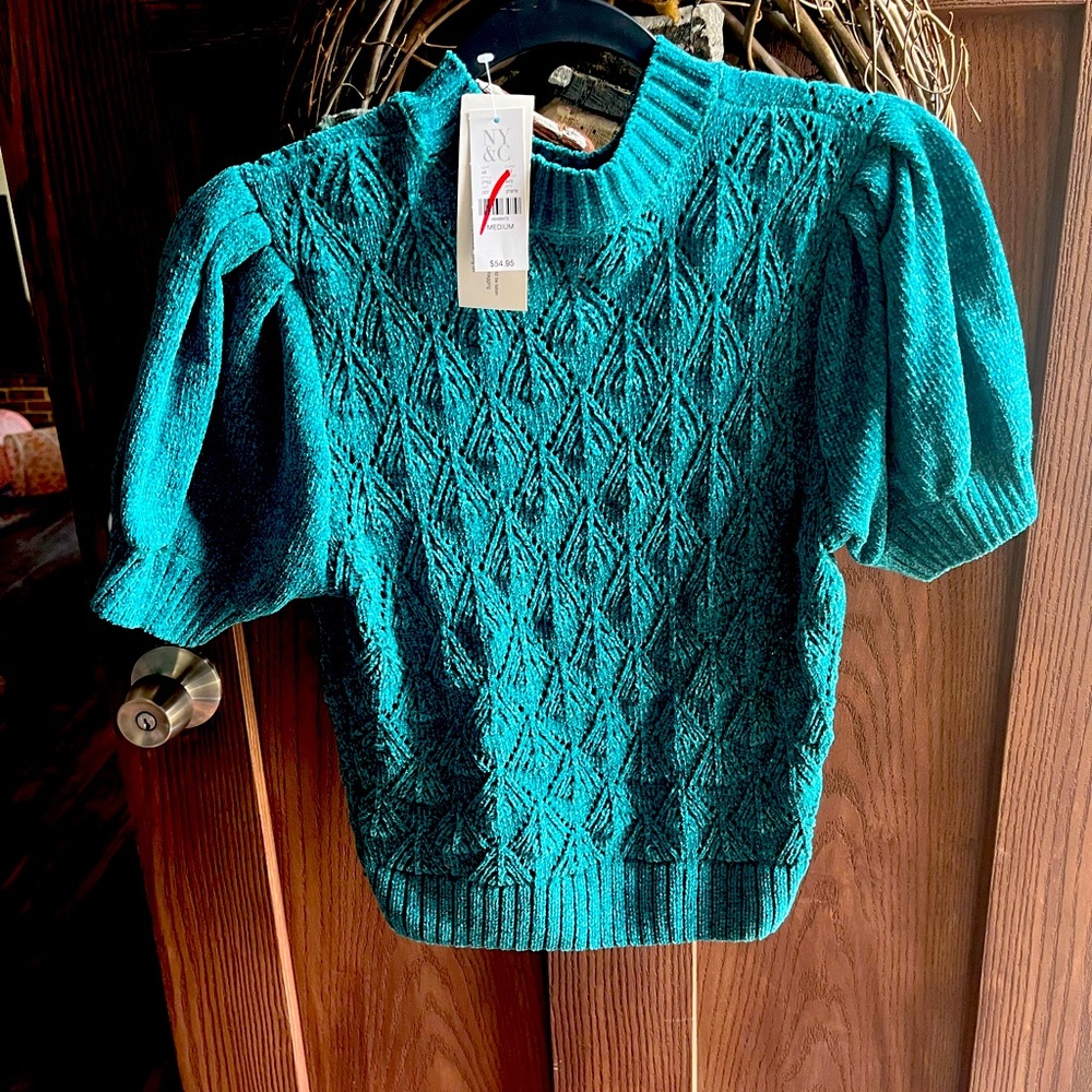 Teal top chenille like material. Very pretty. Never worn.